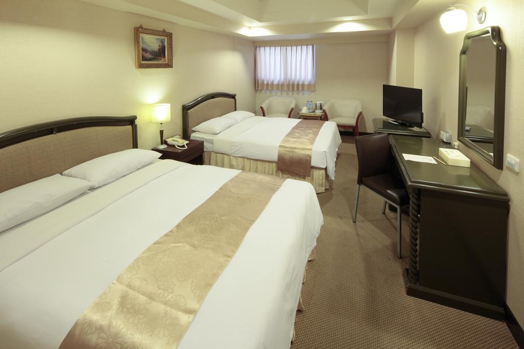 Lincoln Hotel Tainan Værelse billede