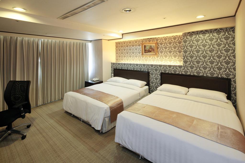 Lincoln Hotel Tainan Værelse billede